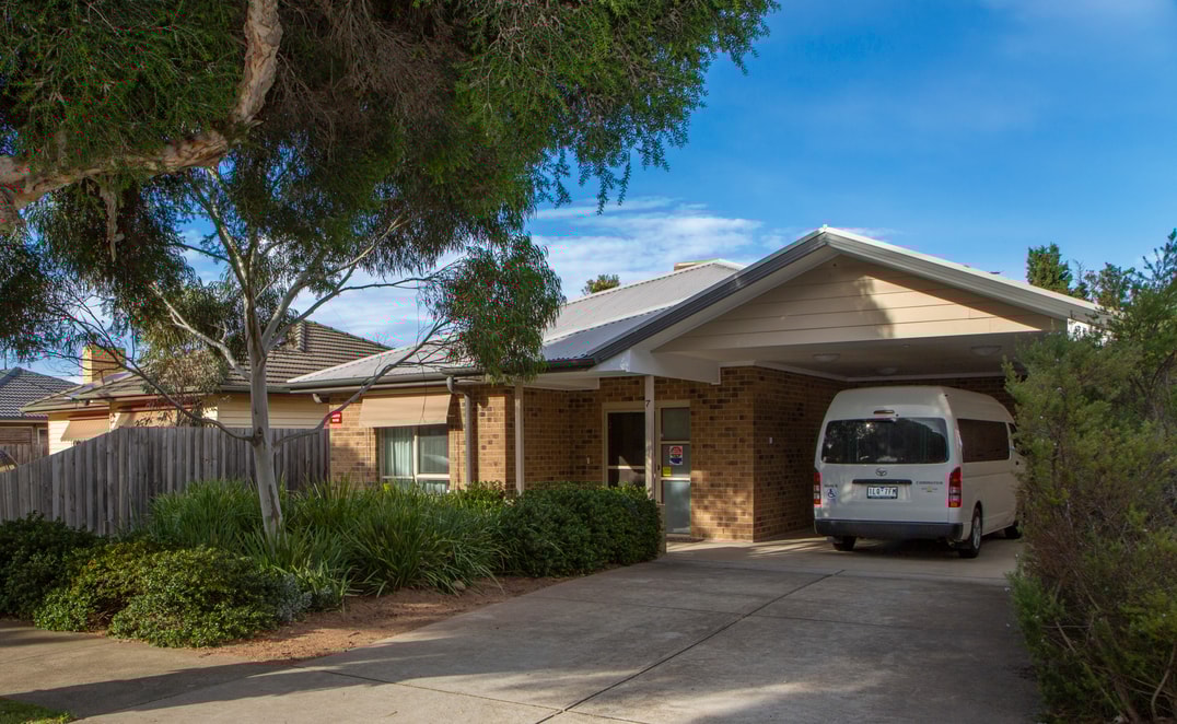 Driveway and carport area at STAA home in Belmont