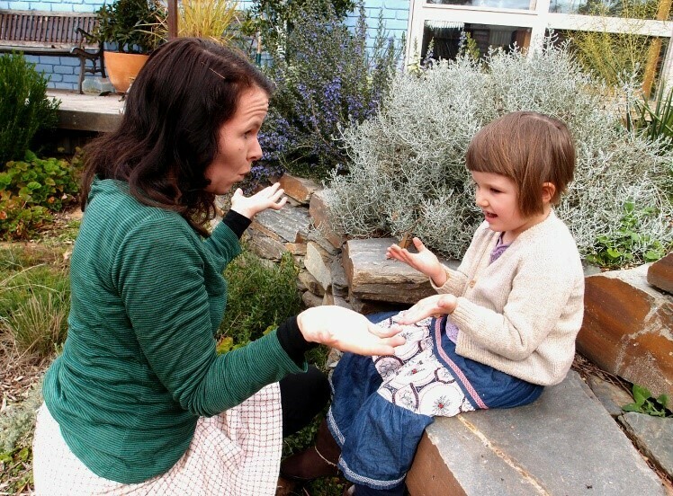 Child and mother sign language