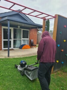 Luke mowing the lawn