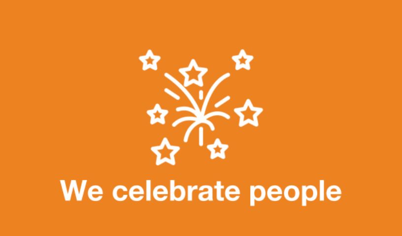 "We Celebrate People" sentence with its icon in white sits atop a orange background.