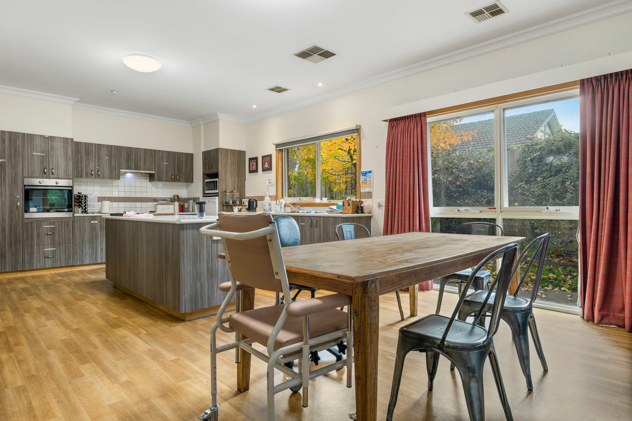 Dining area and kitchen area at SDA home in Ferntree Gully