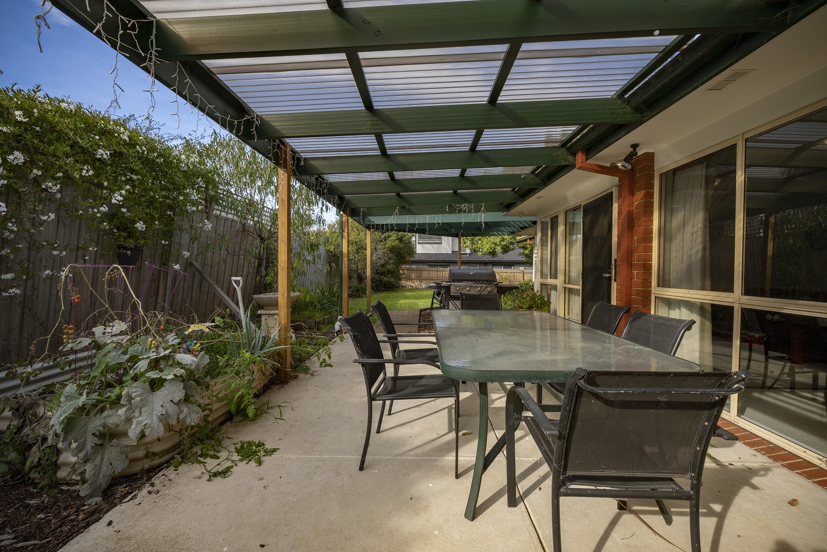 Undercover backyard area with table and chairs