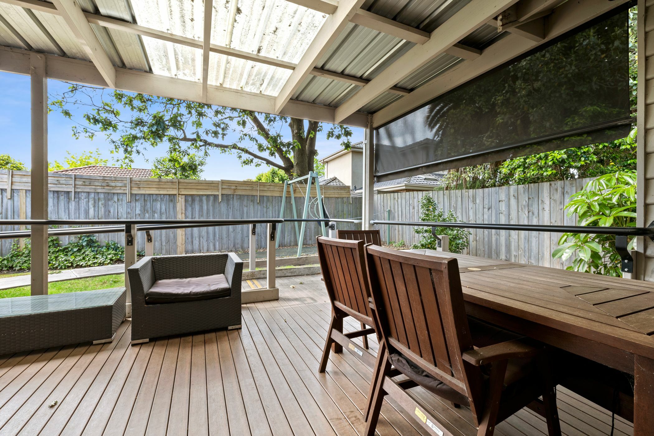 Undercover decking area with table and chairs