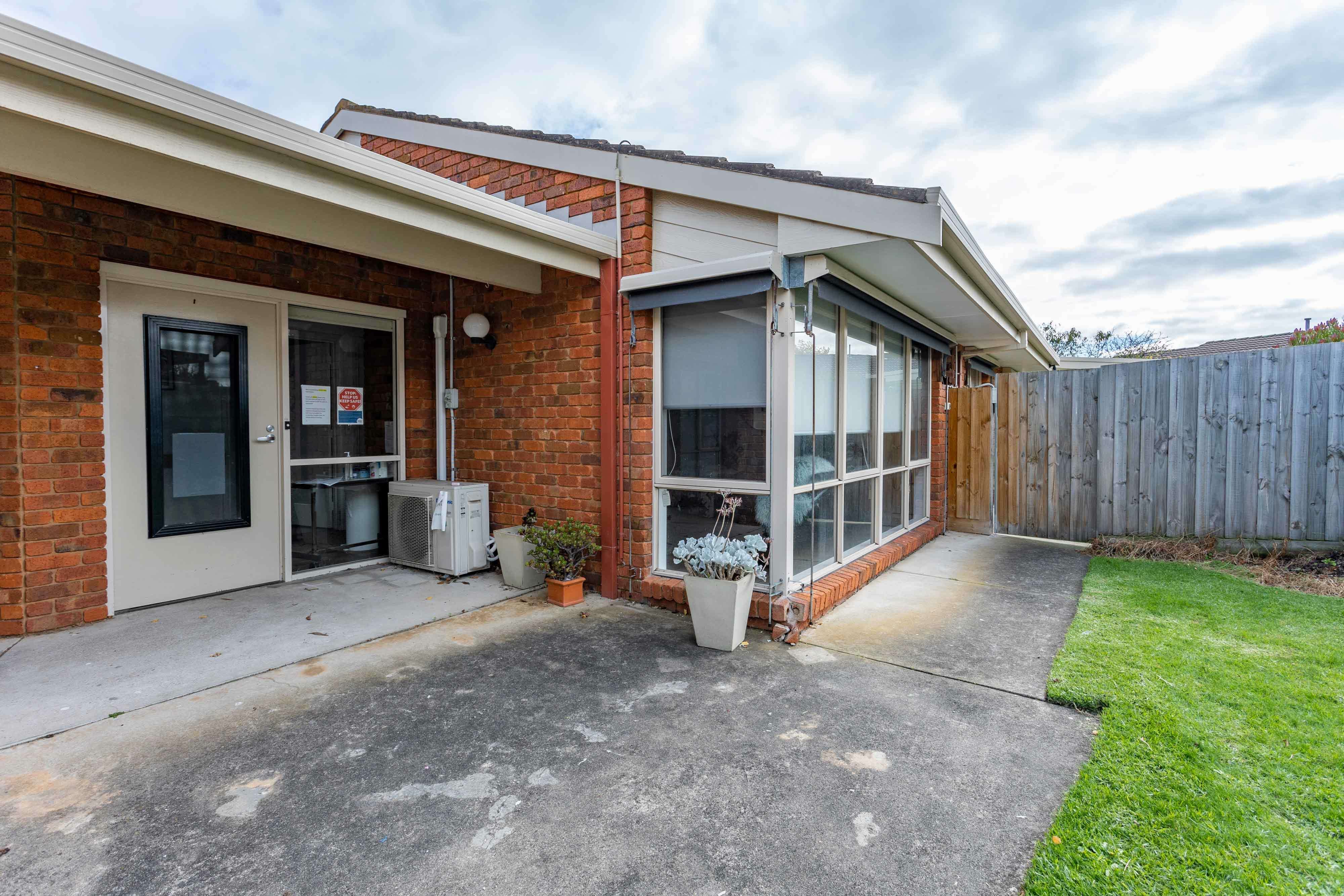 Front porch and yard of SDA home in Warrnambool