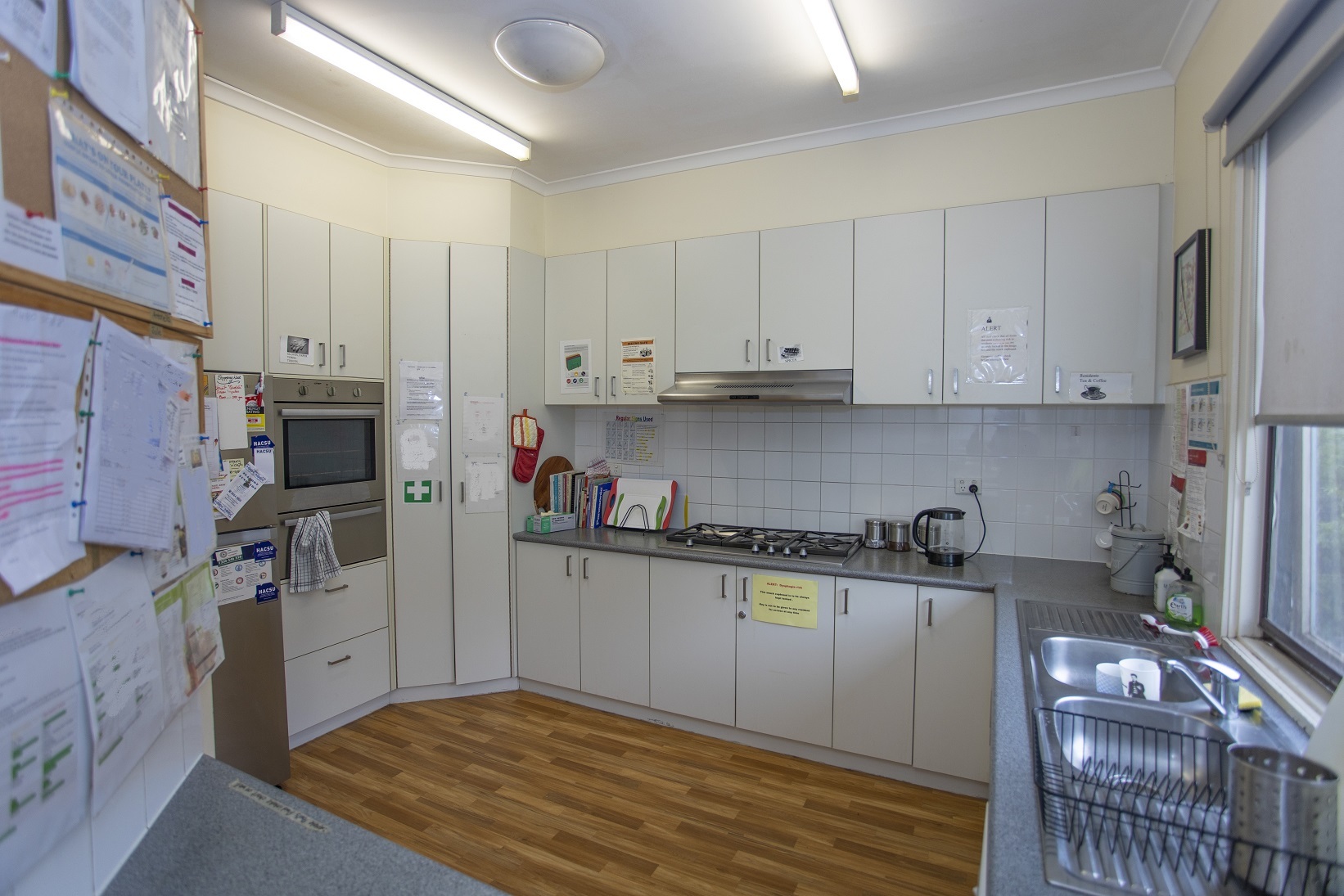 Kitchen area with wooden floorboards